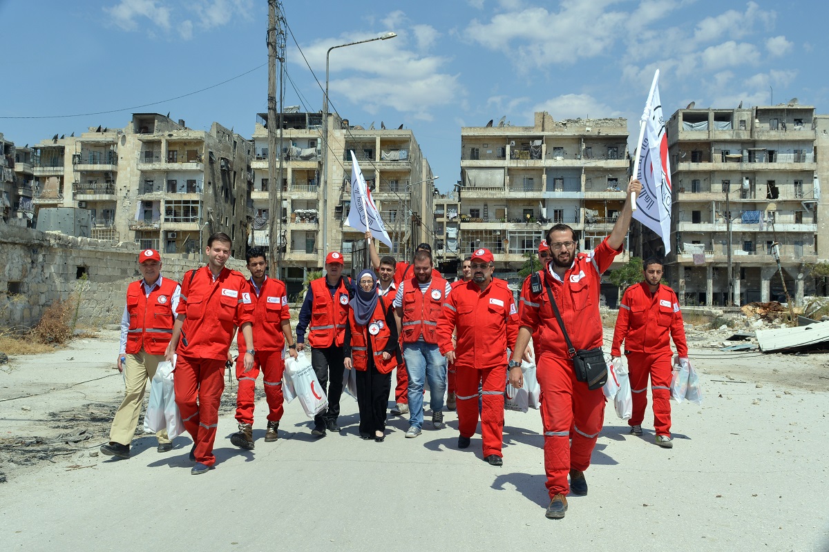 Head of ICRC delegation in Syria, with a team of ICRC and Syrian Arab Red Crescent (SARC) crossing front line in Aleppo, August 2015. SARC