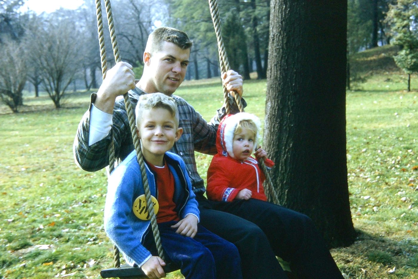Colleen Shine with her father in a swing