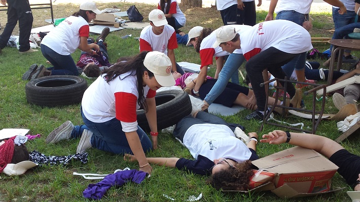 Responding and giving medical treatment during an Earthquake: dozens of youths participated in MDA unique training, which included working methods of the Red Cross Movement