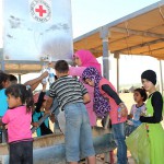 Jordan. ICRC provides drinking water to Syrian refugees in Hadalat transit facility on the north-eastern border.  / CC BY-NC-ND/ICRC/A. Sari