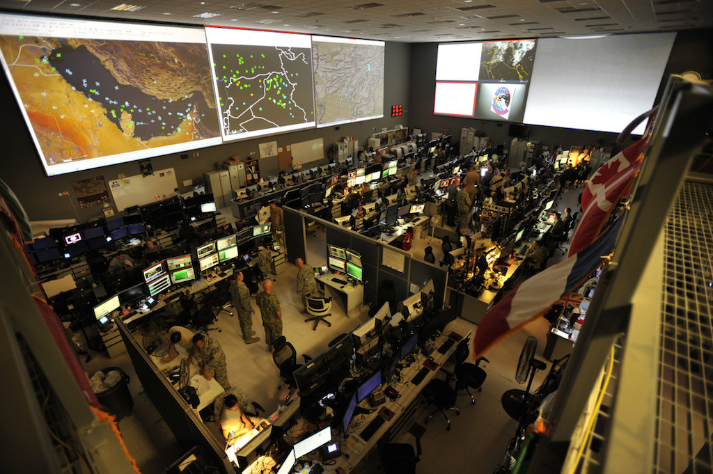 Combined Air Operations Center (CAOC) at Al Udeid Air Base, Qatar, provides command and control of air power throughout Iraq, Syria, Afghanistan, and 17 other nations. The CAOC is comprised of a joint and coalition team that executes day-to-day combined air and space operations and provides rapid reaction, positive control, coordination, and de-confliction of weapon systems. U.S. Air Force photo. Tech. Sgt. Joshua Strang.