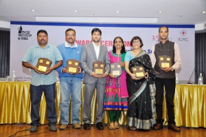 The winners of PII-ICRC media awards. (From left) Pattabi Raman, Manob Chowdhury, Pervez M Lone, Lakshmi Subramanian, Sohini Chattopadhyay, Sumir Karmakar. @ICRC